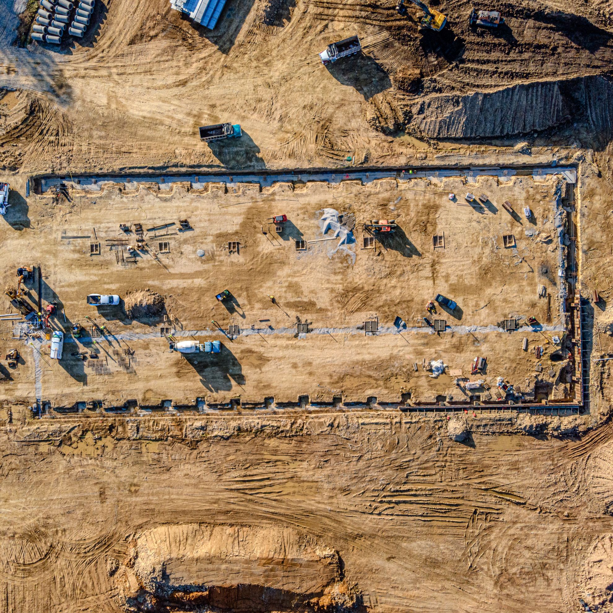 Aerial drone view of an active Colorado construction site documenting build progress
